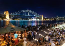 a large gathering at the Sydney Harbour Bridge