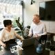 a man and a woman having conversation in the office