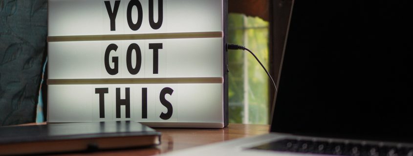 a letter board on the desk with an inspirational message